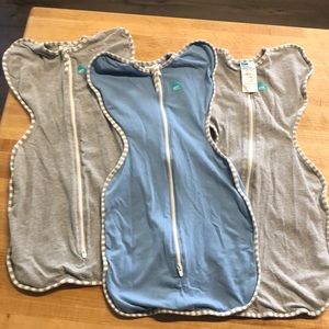 Three Love to Dream Swaddle Up original swaddles. All size small.